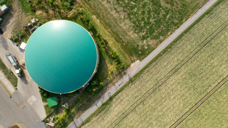 image of field and circular building