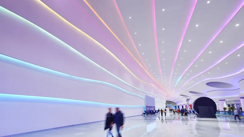 image of people walking indoors