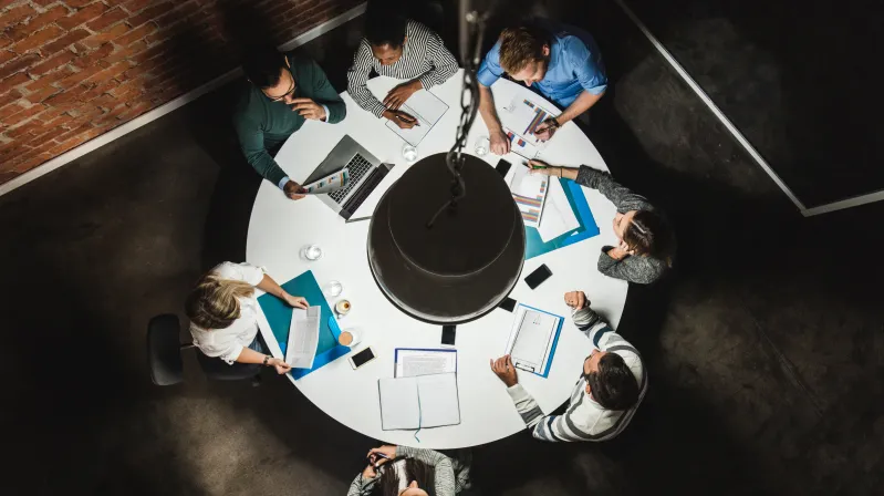 Image of a round table meeting
