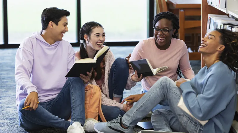 image of people on ground launghing