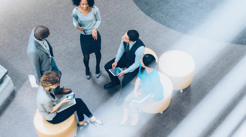 image of employees standing around