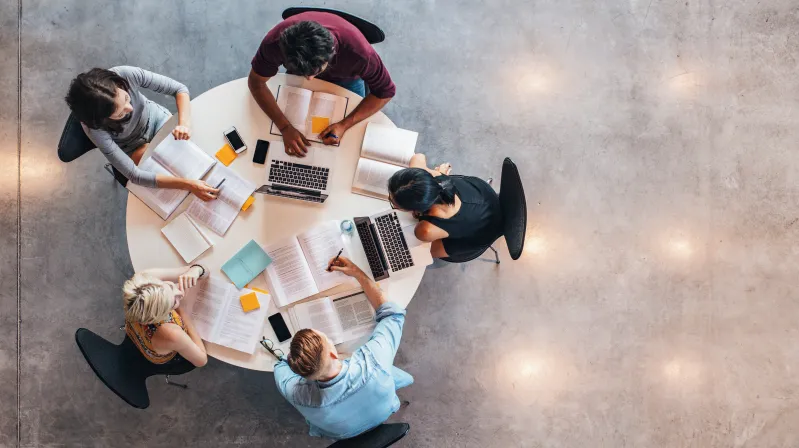 image of people sitting in a circle