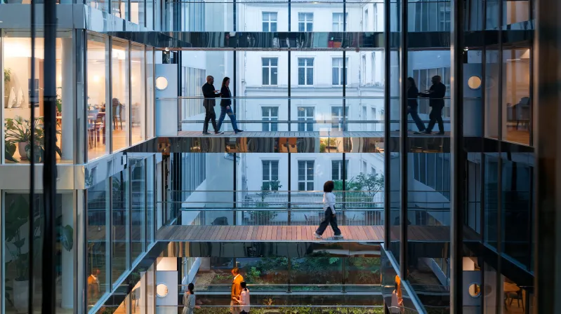 image of employees walking in the building