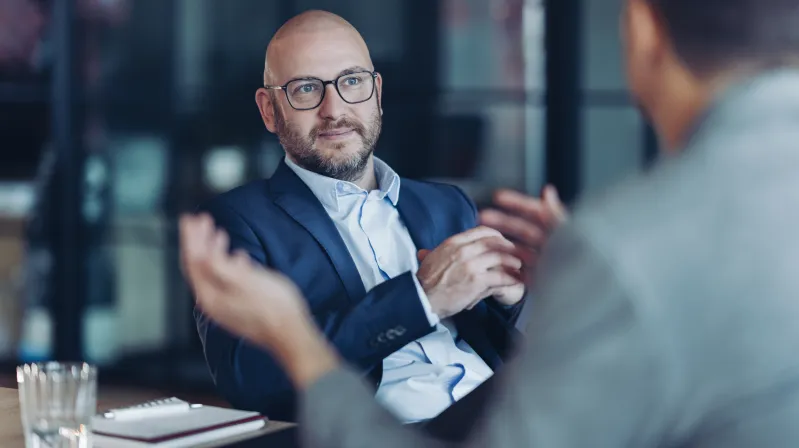 Business Conversation Taking Place in the Workplace