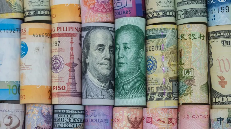 image of rolled up dollar bills