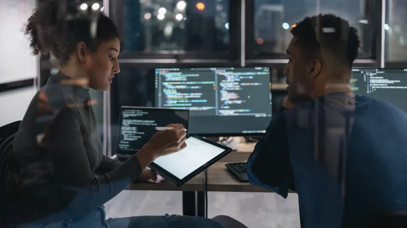 Two employees handling work