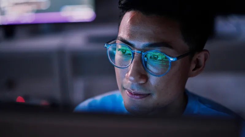 man working on cybersecurity issues