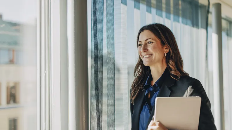 A budgeting expert smiling