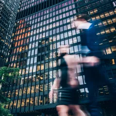 man standing in front of a building