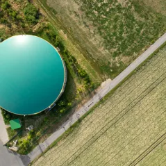 image of field and circular building