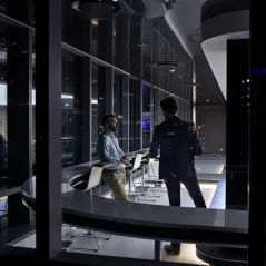 image of two men talking