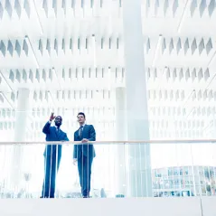 image of men talking together