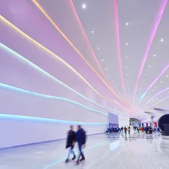 image of people walking indoors