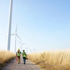 image of two people walking