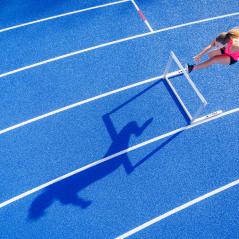 image of person running track