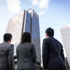 image of people staring at a building