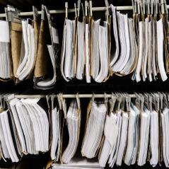 Image of piles of paper hanging