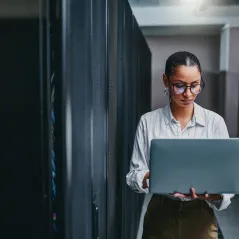 image of woman holding computer