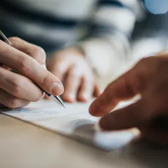 screenshot of the first page of Image of hand and pen