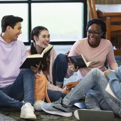 image of people on ground launghing