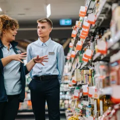 image of people standing in an aisle