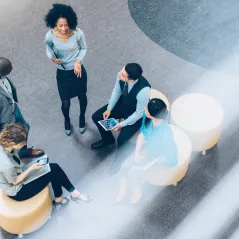 image of employees standing around