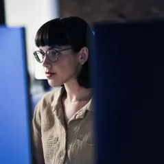 image of woman looking at the computer