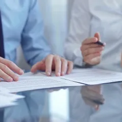 Image of Hands with pen