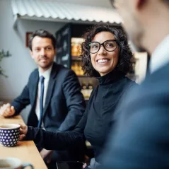 Image of woman smiling at a man
