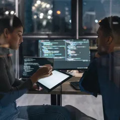 Two employees handling work